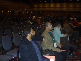 Shaykh Yasir Qadhi and MM-helper Urooj enjoy a keynote speech.