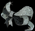 This black and white diamond bow cuff would be a sweet accent to a feminine dress.