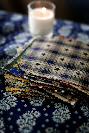 Taryn found tablecloths at Pottery Barn, which she trimmed down to make into runners and napkins. Taryn found tablecloths at Pottery Barn, which she trimmed down to make into runners and napkins.