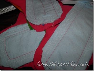 Sewed the lining onto the top flannel piece.  Made channels in one, just two lines on another, and a rectangle on a third
