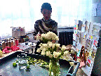 Katie arranged tulips with fringed and frayed edges for a bouquet.