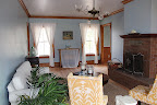 The inside of the beautiful white Victorian is completely redone. What a pretty space for an indoor cocktail hour or rehearsal dinner! The inside of the beautiful white Victorian is completely redone. What a pretty space for an indoor cocktail hour or rehearsal dinner!