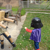 Kai in his home made Iron Man costume, battling Eidan in his Spider Man / Darth Vader / Wizard costume