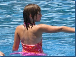 IMG_0778 Two years ago, she couldn't swim. Now I can't keep her away from a pool!