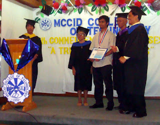 Multi-awarded MCCID Alumnus Aldrin Gabriel receives his certificate of recognition and a special PGMA Academic Excellence Medal for being an Outstanding Alumnus of the Decade.