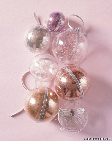 Fill the plastic balls for your pink Christmas tree with butterflies, beads, or a handful of glitter. Then tie a ribbon around each to hide the seam and create a loop for hanging. Fill the plastic balls for your pink Christmas tree with butterflies, beads, or a handful of glitter. Then tie a ribbon around each to hide the seam and create a loop for hanging.
