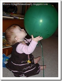 She loved playing with the balloons