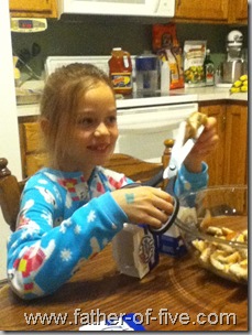 Cutting the burgers for White Castle Stuffing