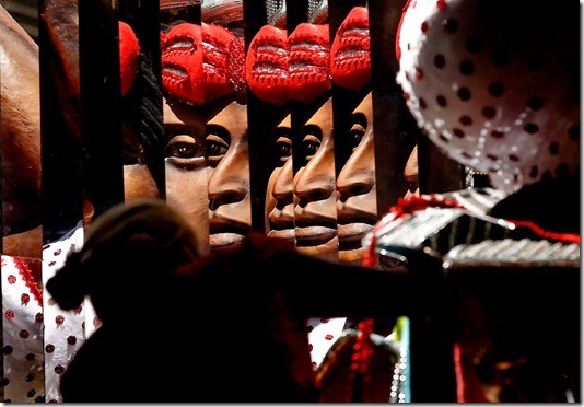 A woman works on a carnival float at the Mocidade Independente de Padre Miguel samba school in Rio de Janeiro on February 15. (Silvia Izquierdo/Associated Press)