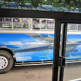 A bus with a United 747 painted on the side!  I wonder if my 1K card would get me special seats?