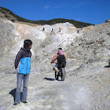 Our guides watches as motorcyclist rides over the Papandayan crater (Daniel Quinn, August 2011)