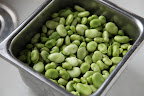 Oh, those are fava beans.  They grow in really large pods and I've heard they are a lot of work to shell.  However, I've also heard they're quite delicious.