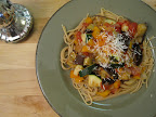 Served over spaghetti and dusted with cheese at dinner.