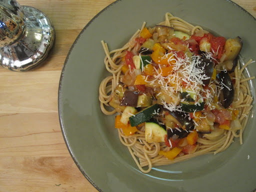 Served over spaghetti and dusted with cheese at dinner.