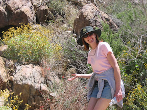Linda next to flowering bush
