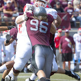 UM's Josh Harris gets physical on the line.  Washington - Grizzly Stadium, Montana Grizzlies vs. South Dakota Coyotes.  Missoula, MT, September 1st, 2012.