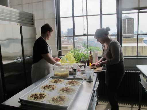 RD and Lo prepping the quesadillas for the shareholders meeting