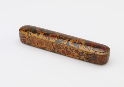 Lacquer pen box | Origin:  Iran | Period: 18th century  Muhammad Ali | Details:  Not Available | Type:   Wood inlaid with mother-of-pearl, brass, malachite, and covered with black lacquer | Size: H: 24.0  W: 4.0   D: 4.0  cm | Museum Code: F1986.9a-b | Photograph and description taken from Freer and the Sackler (Smithsonian) Museums.