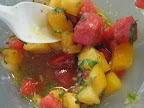 Heirloom tomato basil salid enjoyed with burrata