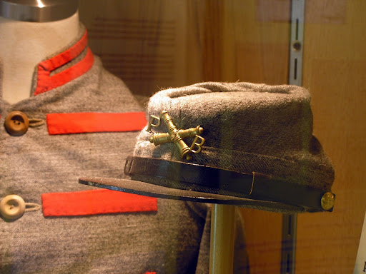 A Confederate artillery kepi and uniform worn by a Pulaski Arkansas Battery member. (Photo credit: Jeremy Shreckhise)