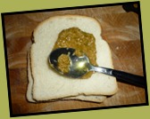 Piccoli sandwich con prosciutto cotto e patè di olive (1)