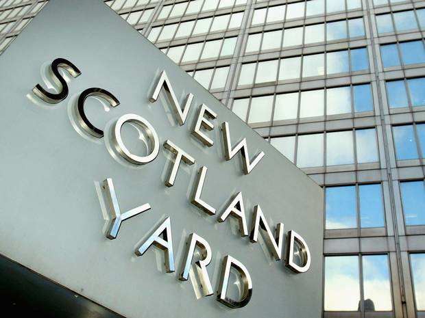 Sign in front of the New Scotland Yard headquarters. Photo: The Independent