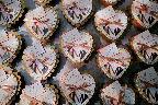 Each guest got a Jacques Torres heart box of chocolate. Bernard Maisner calligraphed each name card Each guest got a Jacques Torres heart box of chocolate. Bernard Maisner calligraphed each name card