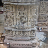 A goddess shown here with eight? hands, the lower two hands are clasped and joined in the front. Rest of the hands are broken, except one lower hands which seems to be holding a kamandalu. Its little strange, a kamandalu in hand, or its a munda (human head) but its not so clear. There seems to an elephant seated near her feet.