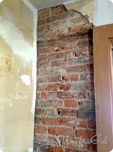 Plaster Wall with Exposed Brick