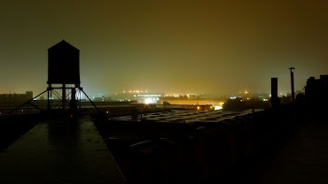 Alberto Orozco
MUP, Spring 2011

Wonder-Roof Bushwick, Brooklyn, NY
The intricacies of Brooklyn&rsquo;s iconic water tank silhouette and an old flat roof-top retaining water while contrasting with the bright backlight of a city that never sleeps.