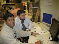20081114c_Prashant and Tyler looking at data.JPG