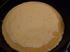 Once the chickpea mixture hits the hot pan it starts to cook around the edges