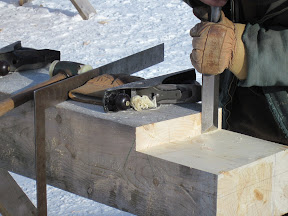 A tie beam shoulder is cut square.