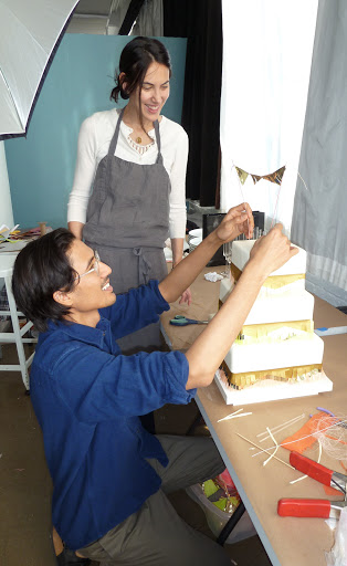Nick placed the final touch on Elizabeth's cake.