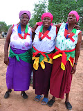 Here's a few of the women in their traditional wear after the mchongolo dance; they asked me to take their picture with me back to America. South Africa - 533.jpg