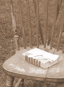 chair with book and glove