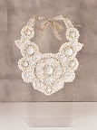 A ribbon tie finishes off the necklace. What do you think? A ribbon tie finishes off the necklace. What do you think?