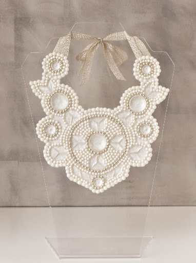 A ribbon tie finishes off the necklace. What do you think? A ribbon tie finishes off the necklace. What do you think?