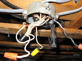 another view of the light fixture before cleanup