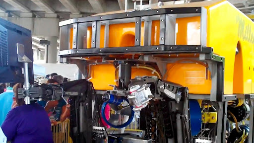Oceaneering underwater robot having a beer after sealing the BP oil well