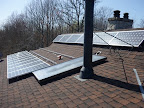Installation of a 4.2 kilowatt solar array under the microFit program.