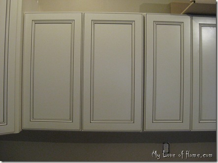 Soft white cabinet with chocolate glaze
