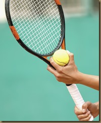 Tennis Player Preparing to Serve --- Image by © Royalty-Free/Corbis