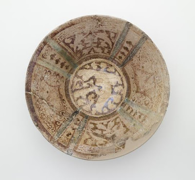 Bowl | Origin:  Syria | Period: 12th-13th century  Ayyubid period | Details:  Not Available | Type: Stone-paste; decorated with lustre | Size: H: 11.6  W: 23.6  cm | Museum Code: F1908.149 | Photograph and description taken from Freer and the Sackler (Smithsonian) Museums.