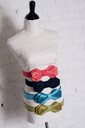 Are your fiance's groomsmen donning bow ties? Have your bridesmaids mirror their look with a bow-tie-like belt.
