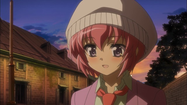 Shiina, in hat and coat, speaks from the heart outside in the evening