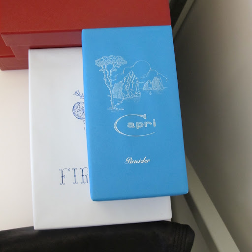 I kept these boxes that once held wedding stationary because of their color and beautiful illustrations.