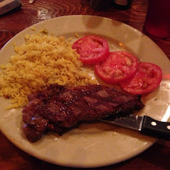 Steak, rice, tomatoes