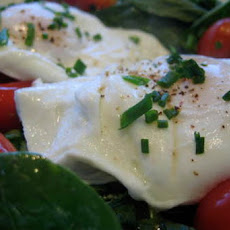 Poached Eggs over Baby Spinach w/ Chives and Cherry Tomatoes
