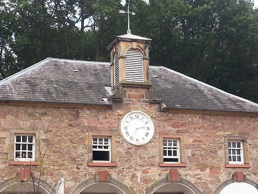 The Old Stables Clock And Weather Vane